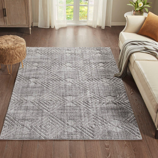 Lovelaceville-Geometric-Gray-Rug-White-Stone-Decor